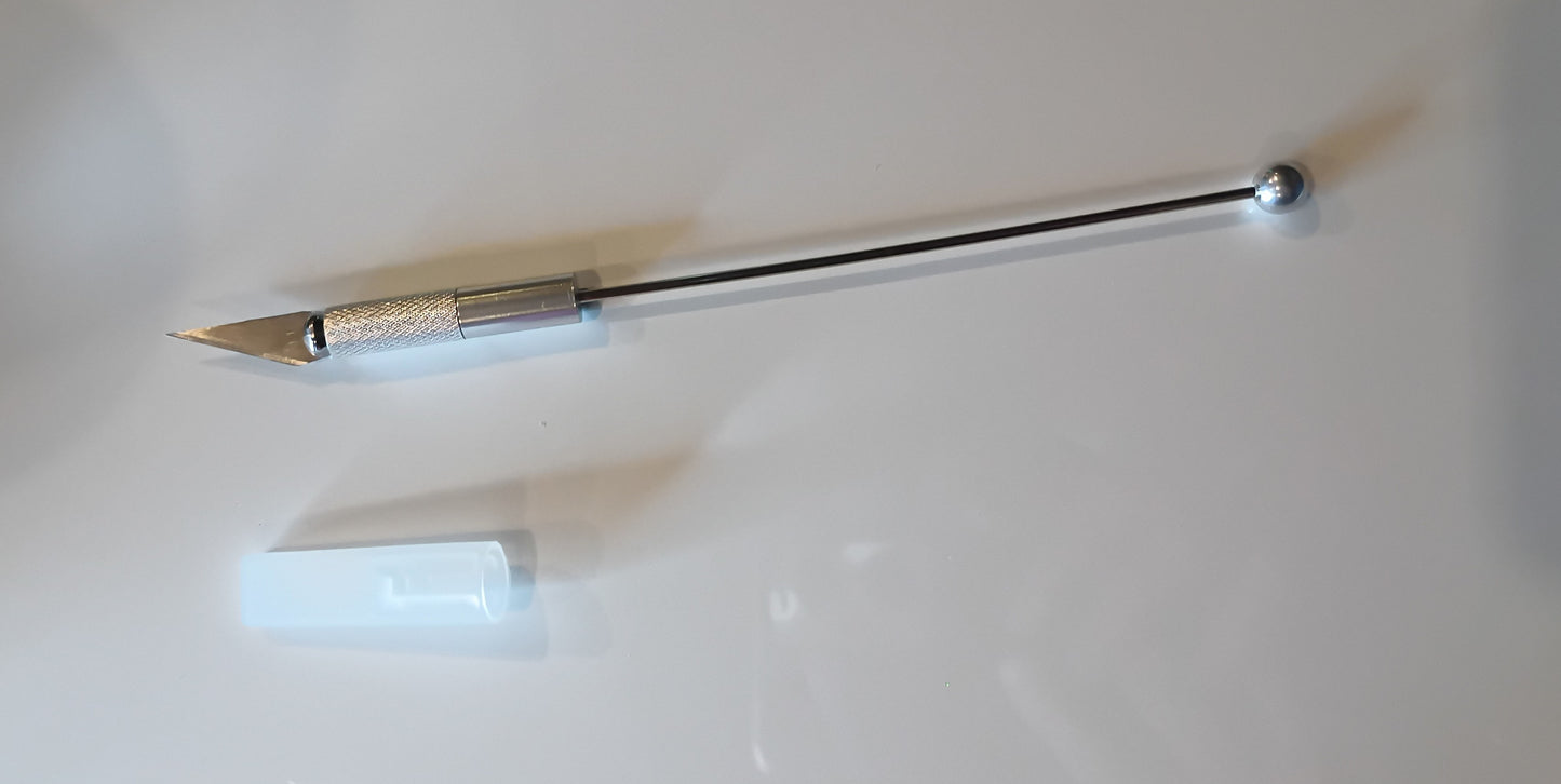 Beaded exacto knife